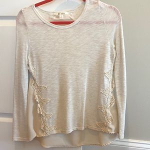 Dressy cream top. Has a sheer back